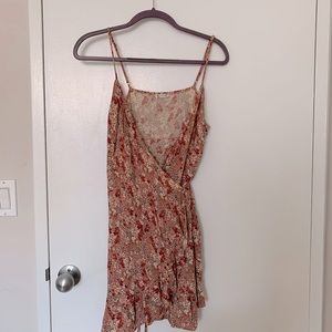 Strappy wrap-front sundress with ruffle hem